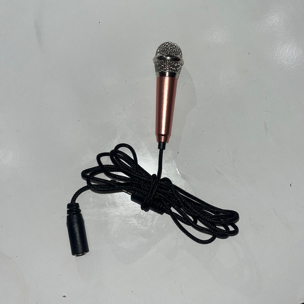 Mini microphone. color: rose gold.